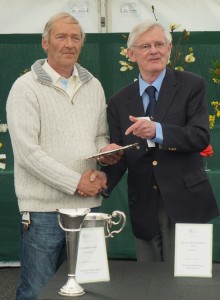 Ken Harrop receives his trophies from Malcolm Bradbury